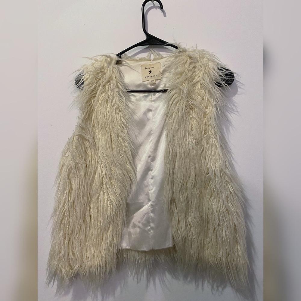 White faux fur vest